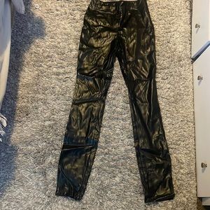 Black leather stacked pants